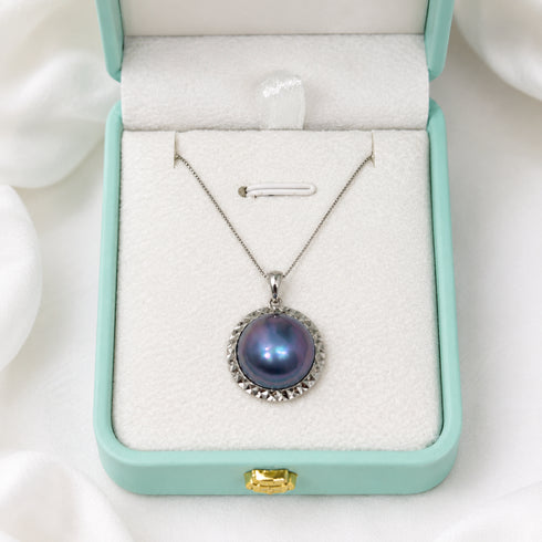 Necklace: House of Pearls blue mother-of-pearl statement pendant with silver bezel