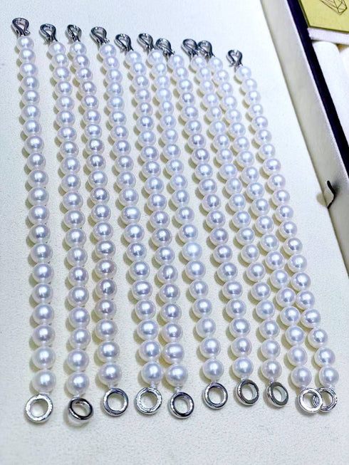 Bracelets set of 8-9mm Chinese White Akoya cultured pearl strands with silver clasps, House Of Pearls