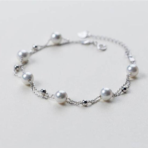 Layered White Freshwater Pearl Bracelet with silver chain and pearl beads