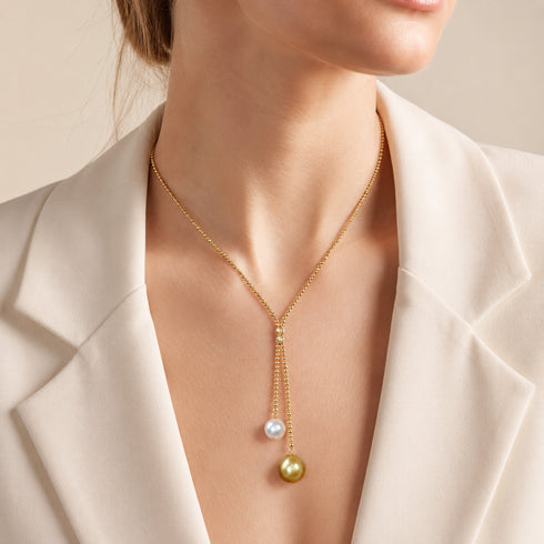 Y-shaped gold necklace featuring Akoya white pearl and Golden South Sea pearl pendant, 18K gold