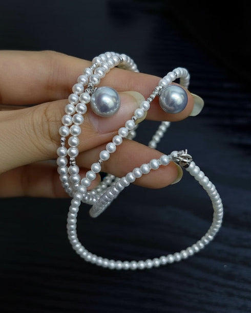 Aurora Freshwater Pearl Double-Chain Bracelet, white pearl strands with silver spacers.