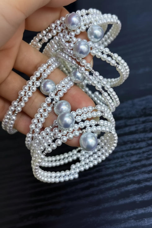 Aurora Freshwater Pearl Double-Chain Bracelet, white pearl strands with silver spacers.