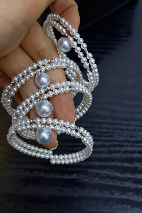 Aurora Freshwater Pearl Double Chain Bracelet by House Of Pearls - TA; multi-strand white pearls with silver spacers.