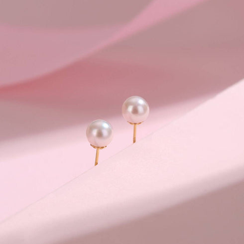 Pearl stud earrings, 4–5mm white freshwater pearls on gold posts