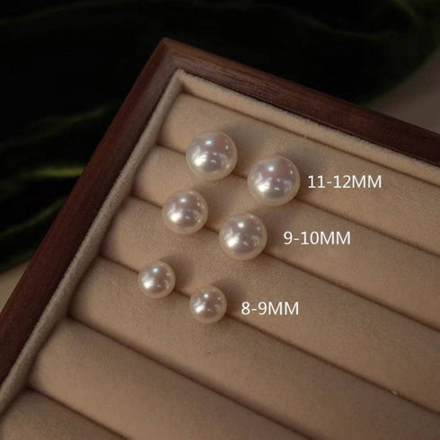 Freshwater white pearl stud earrings, 9–10mm oval, displayed in a jewelry box with 8–9mm and 11–12mm size options