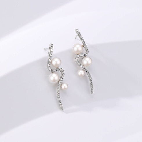 Elegant Curve 925 Silver & Freshwater Pearl Studs - House Of Pearls