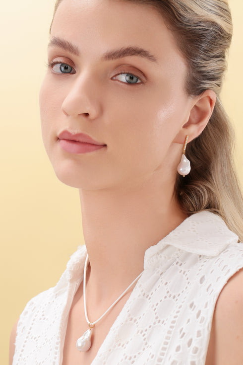 Earrings, 11-13mm baroque pearl drop with zirconia-accented gold-tone setting
