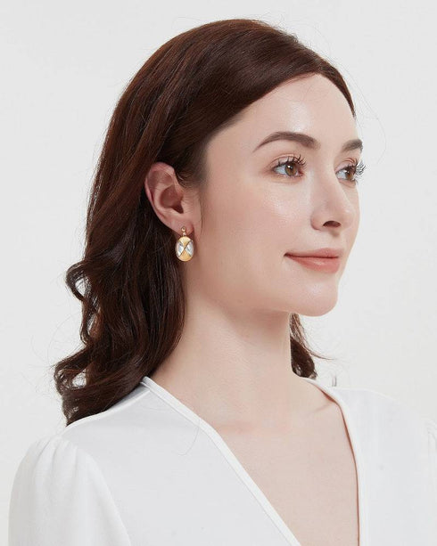Rhombus Mother of Pearls Earrings in gold vermeil, elegant drop style on model