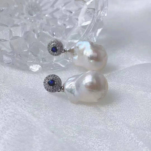 Earrings Sapphire White Freshwater Baroque Pearl with blue sapphire halo, set in silver