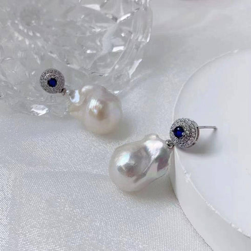 Pair of Sapphire White Freshwater Baroque Pearl Earrings by House Of Pearls in sterling silver