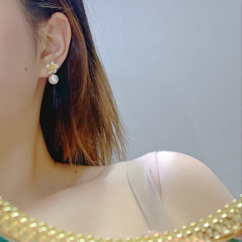 Flower freshwater pearl earrings and necklace set; flower earrings with pearl drops and gold-tone beaded necklace