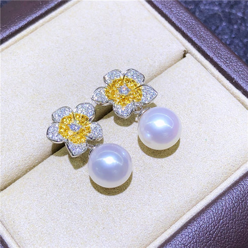 Flower-shaped freshwater pearl earrings, dangling white pearls with silver petals and yellow centers, 2-pc set