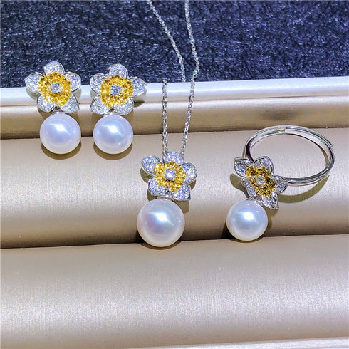 Flower freshwater pearl jewelry set: earrings, necklace, and ring with silver petals, yellow centers, and white pearls