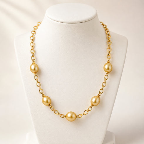 Golden South Sea pearl chunky-link necklace on a gold-tone chain.
