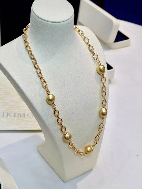 Golden South Sea Baroque pearl chunky-link necklace with a gold-toned chain and evenly spaced pearls