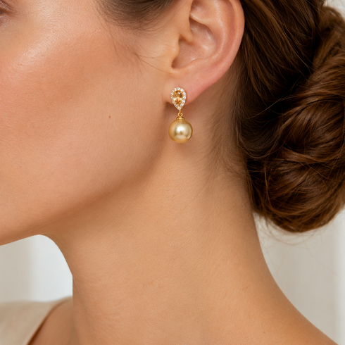 Earrings: 11–12mm Golden South Sea Champagne pearl drop with diamond halo