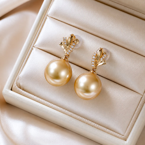 Earrings: Golden South Sea pearl drops in 18K gold with diamond accents, 12-13mm pearls