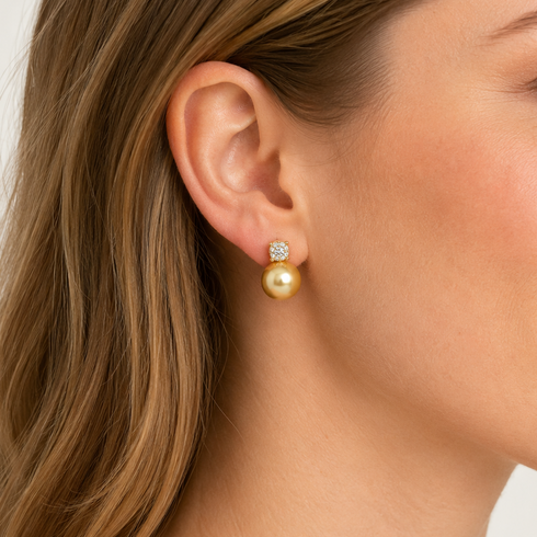 Earrings by House Of Pearls FT: 11–12mm Golden South Sea pearl drop with diamond top in 18K gold