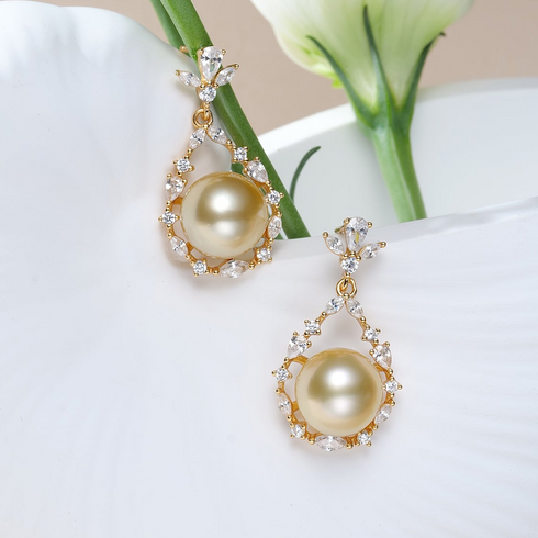 Pair of 10–11mm Golden South Sea Pearl Floral Teardrop Halo Earrings with gold settings and crystal accents