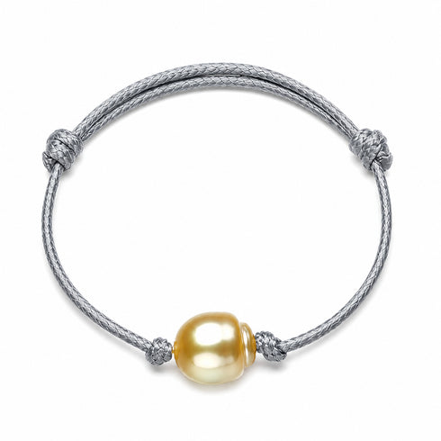 Bracelet: Golden South Sea baroque pearl on a braided silver cord with knotted ends, adjustable; House of Pearls-TA