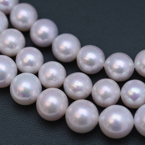 Graduated white freshwater pearl necklace by House Of Pearls, classic strand.