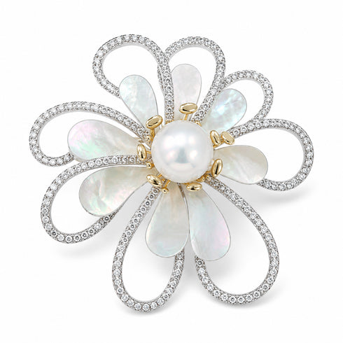 Brooch floral design with 10–11mm freshwater pearl center, mother-of-pearl petals, pavé diamond loops.