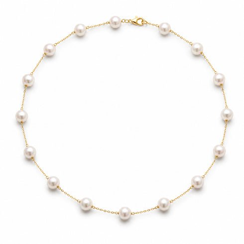 Necklace: 7–8mm white freshwater pearl tincup on an 18K gold chain, House Of Pearls XM