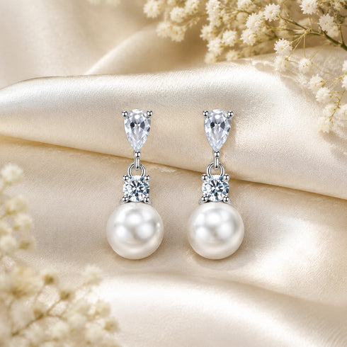 Earrings: 7-8mm white Akoya pearl drop with zirconia accents in a silver setting (2 pcs)