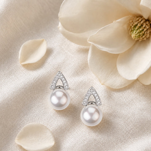 Earrings: 8-9mm Japanese Akoya cubic zirconia stud earrings with pearl drop, silver-tone pavé triangle