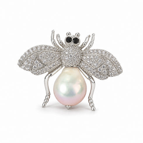 Cubic Zirconia Bee Brooch with pearl abdomen and crystal wings in silver tone.