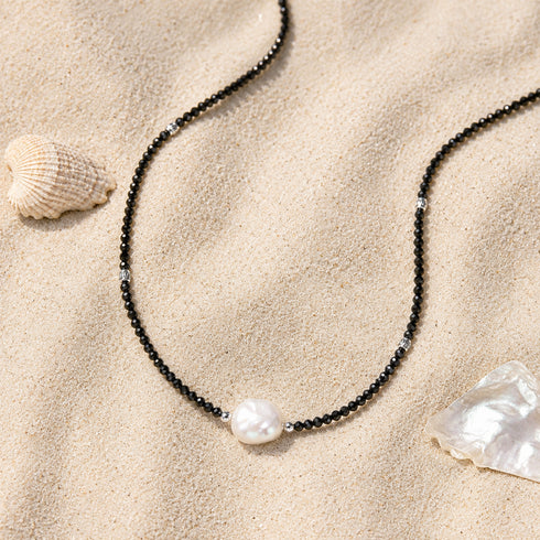 Choker necklace of black spinel beads with a single baroque pearl centerpiece, House Of Pearls - VA