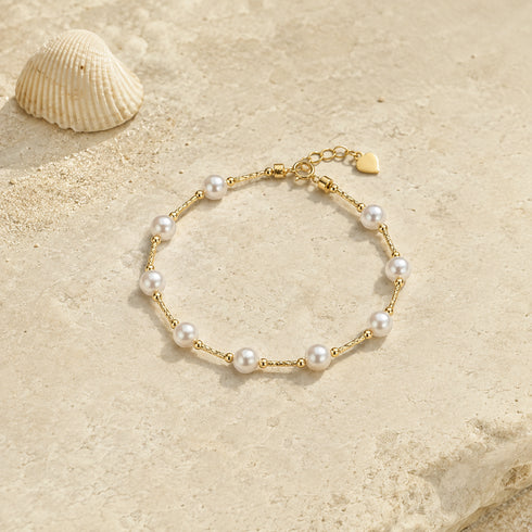 Bracelet with 6-7mm freshwater pearls on an 18K gold chain, heart charm, House Of Pearls - TA