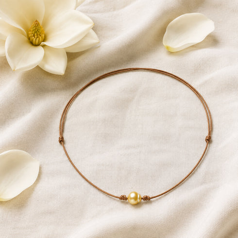 Golden South Sea Pearl Knotted Leather Bracelet, Necklace Set with a single golden pearl on brown leather cord