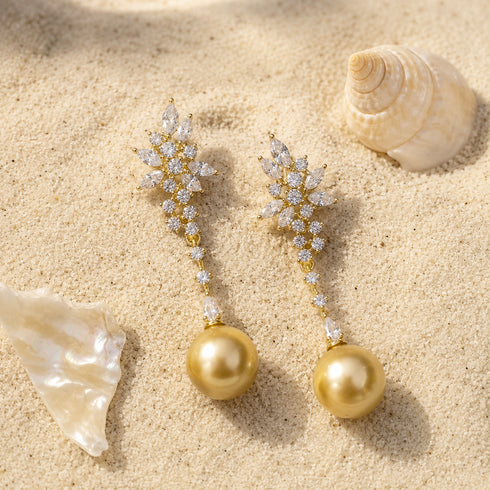 Pair of gold-tone earrings with snowflake crystal clusters and golden South Sea pearls, House Of Pearls - FT