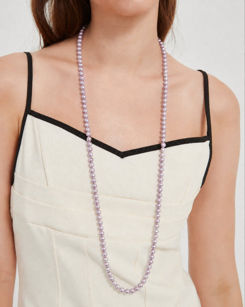 Necklace: 35-inch purple freshwater pearl rope by House Of Pearls, AAA grade.