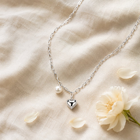 Silver Heart Pearl Pendant Necklace with a pearl bead and heart charm on a delicate chain