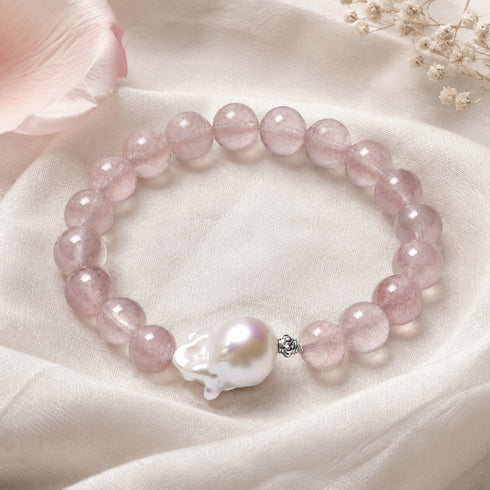 Bracelet with rose quartz beads and a baroque pearl centerpiece by House of Pearls-vera.