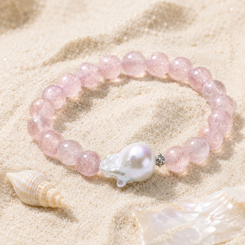 Bracelet with pink rose quartz beads and a baroque pearl centerpiece