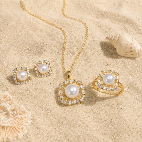 Square zirconia freshwater pearl jewelry set, gold-tone, 4-piece: necklace, pair of earrings, and ring.