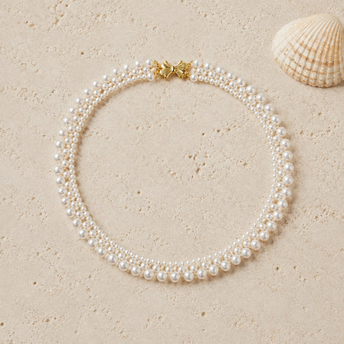 Gradual Pearl Braided Bow Necklace
