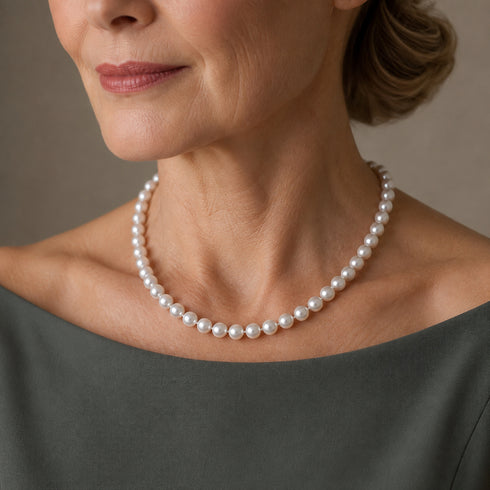 8-9mm white freshwater pearl necklace by House Of Pearls XM worn on model.