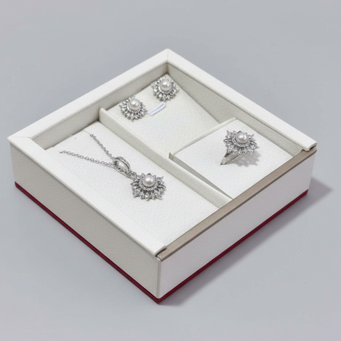 Starburst Pearl Jewelry Set by House of Pearls-TA; silver-tone necklace, earrings, and ring with pearl centers.