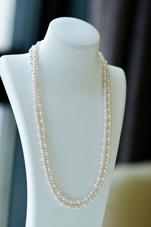 Two-strand Akoya pearl opera necklace, 3–5 mm white lustrous pearls