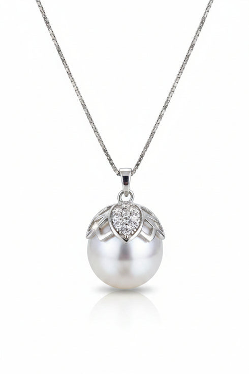 Necklace featuring white South Sea baroque pearl butterfly pendant with a diamond-accented cap on a gold-tone chain.