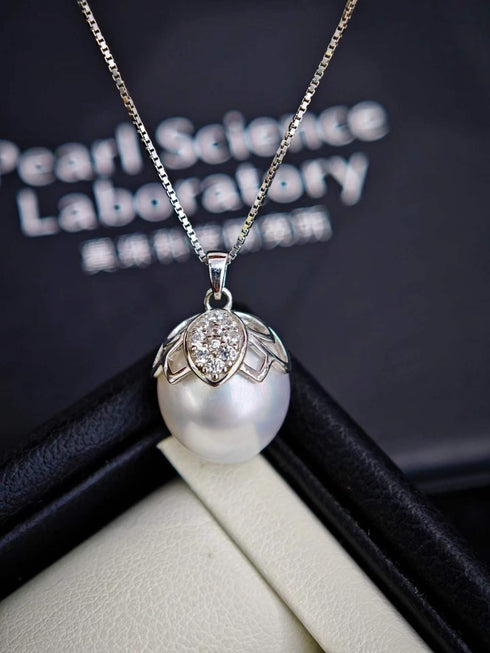 Necklace with white South Sea baroque pearl pendant and diamond butterfly cap on a silver chain (House Of Pearls - JX)