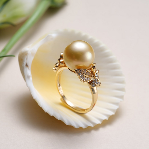 Ring: 11–12mm Golden South Sea Pearl Floral Ring in yellow gold with pavé diamond leaf accents