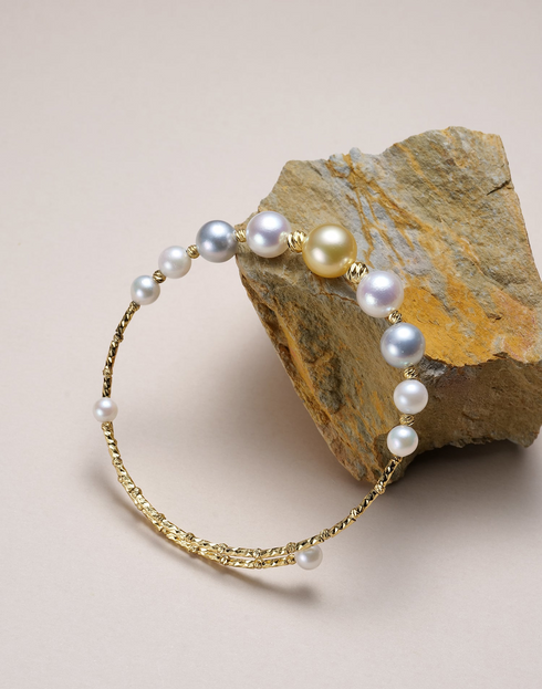 Bracelet: Smile Golden South Sea & Akoya Pearl Bangle by House Of Pearls, gold-tone band with white and golden pearls