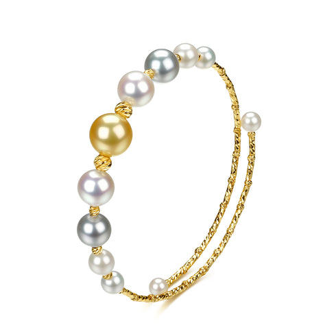 Bracelet set by House Of Pearls: two Smile Golden South Sea & Akoya pearl bangles on textured gold bands