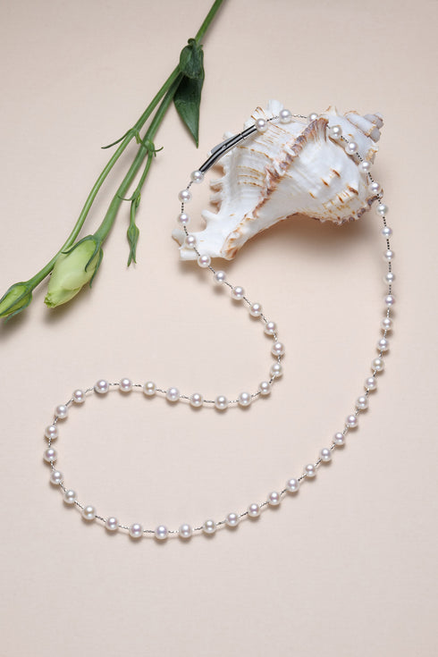 Necklace 43-inch freshwater purple rice pearl strand with silver spacers