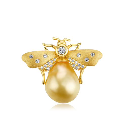 Gold bee brooch with AAA-grade 11–13mm Golden South Sea pearl body and diamond-studded wings with pavé accents.